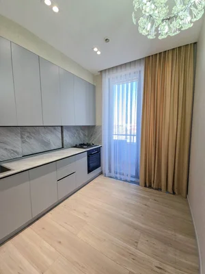 Фото 2 2-комн. квартира в Садык Азимова Эфенди